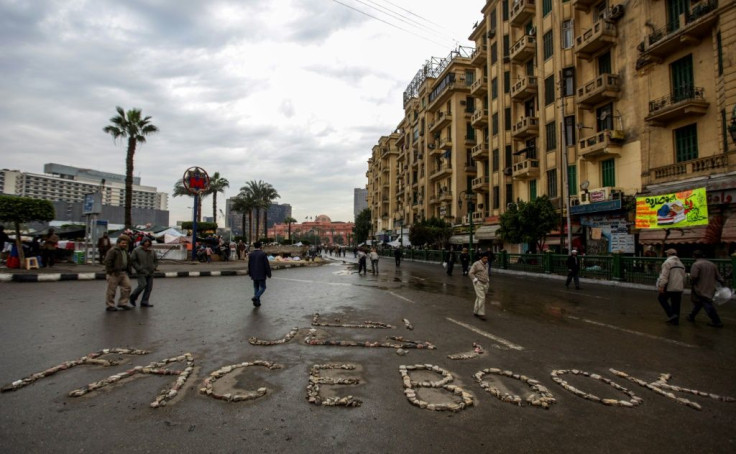 "Facebook" is written with stones in Cairo's Tahrir Square on February 6, 2011, the epicenter of anti-regime protests