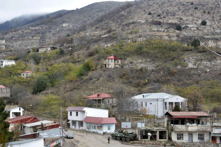 Russian peacekeepers man a checkpoint in the town of Lachin