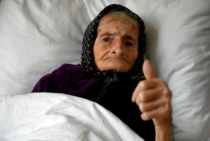A 99-year-old Croatian woman gives the thumbs up after she successfully beat the coronavirus