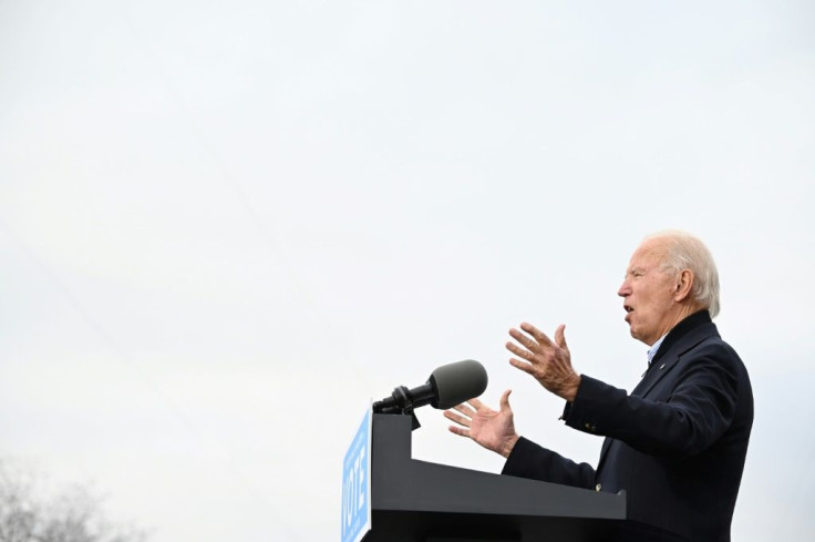 Joe Biden flew into Georgia -- a southern state he won in an upset against President Donald Trump -- to host a rally for two Democratic candidates in runoff races that will determine the Senate's balance of power