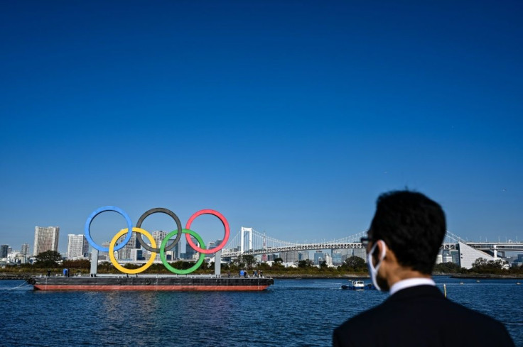 Ringing the changes: the Olympic logo was removed from the waterfront in Tokyo before being reinstalled at the start of December