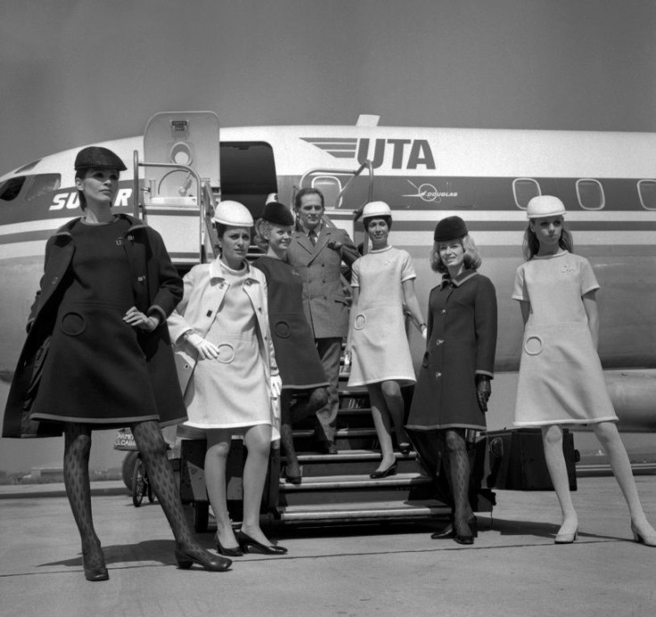 This file photo taken on May 9, 1968 shows Cardin presenting the new uniforms of UTA' s flight attendants at Le Bourget airport in Paris.