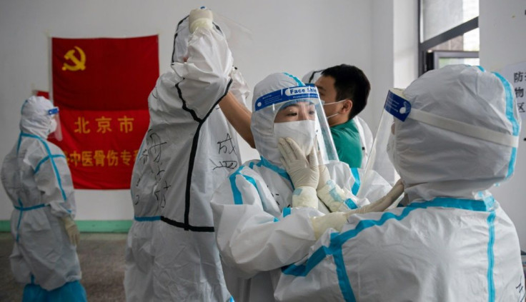 A WHO team is due to visit China for a highly politicised trip exploring the origins of the coronavirus, which first emerged in the city of Wuhan in December 2019