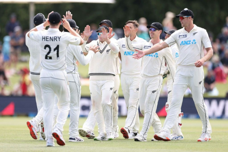New Zealand players celebrate the victory which saw them attain the world's top Test team ranking