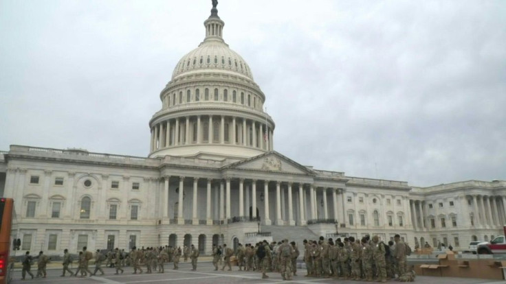 The US Capitol is open to lawmakers and staff, but under tight police and military security