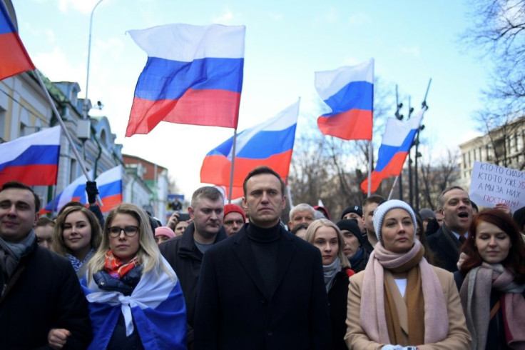 Navalny, his wife Yulia, opposition politician Lyubov Sobol and other demonstrators march in memory of murdered Kremlin critic Boris Nemtsov in downtown Moscow in February 2020