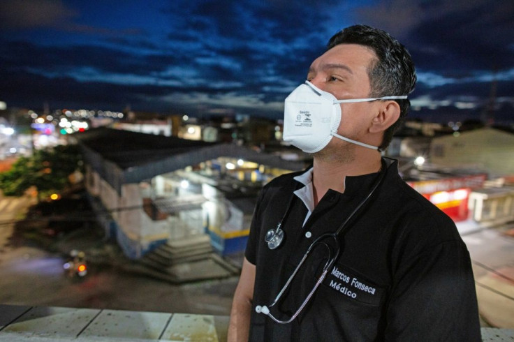 Brazilian doctor Marcos Fonseca Barbosa is caring for his COVID-19 infected mother at home