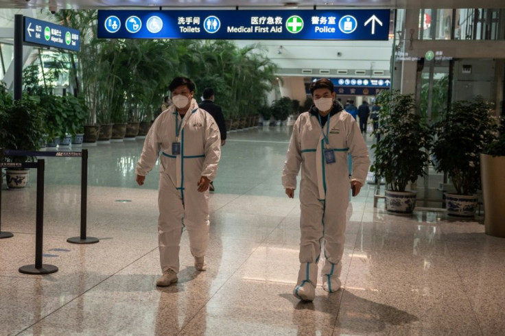 Health workers were waiting to meet the WHO team as they arrived in Wuhan on Thursday ahead of their probe into the origins of the pandemic
