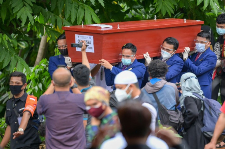 The funeral of Okky Bisma, the first confirmed victim of the aviation disaster