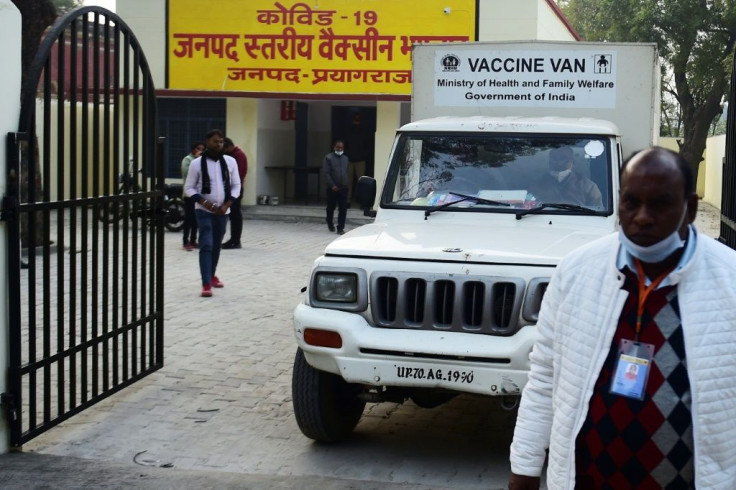 A van carries boxes of Covishield vaccine to different centres in Allahabad on January 15, 2021 with some 150,000 staff in 700 districts trained to administer the jabs across India