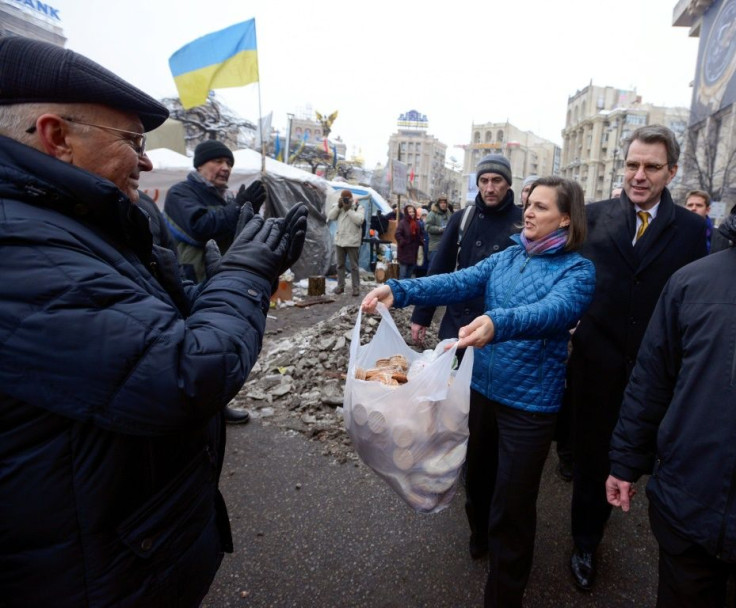 Victoria Nuland, who has been named for another top State Department position, distributing cakes to protesters on Independence Square in Kiev in December 2013