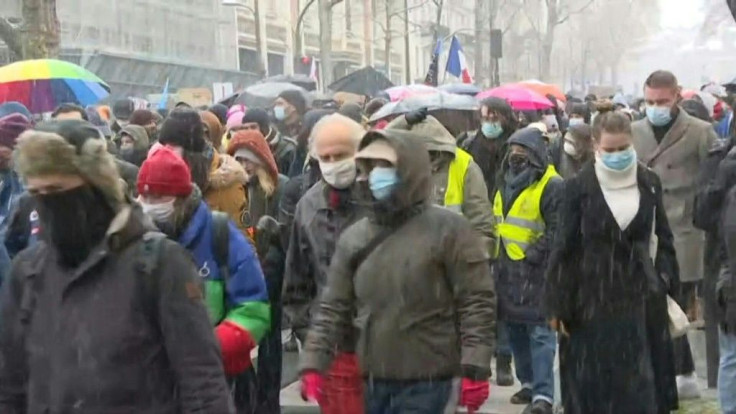 Thousands march in Paris against a controversial security bill