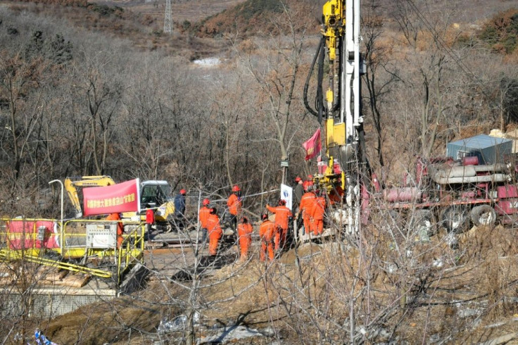 Rescuers have already dug three channels and sent food, medicine, paper and pencils down thin shafts