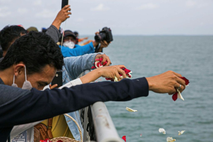 The memorial came as the search for human remains and wreckage ended after the Sriwijaya Air Boeing 737-500 plunged into the sea killing all 62 onboard