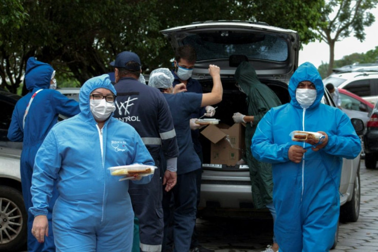 Volunteers have taken it upon themselves to distribute food to coronavirus patients and health workers at hospitals in Brazil's Manaus