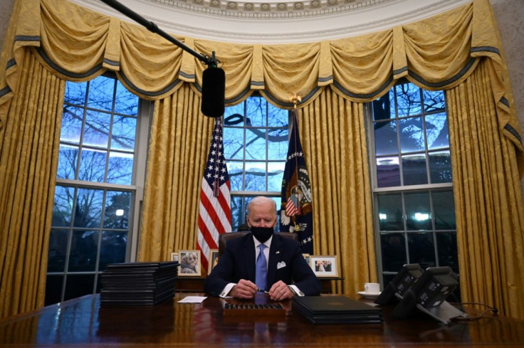 On day one, US President Joe Biden wore a mask in the Oval Office