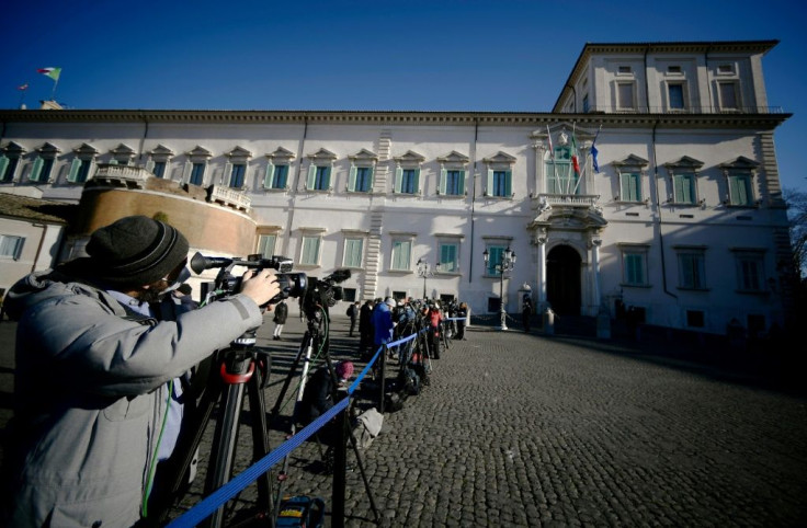 Journalists wait for the arrival of Conte at the Presidential Quirinale Palace in Rome for a meeting with President Sergio Mattarella