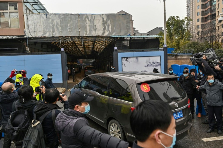 Members of a WHO team investigating the origins of Covid-19 arrived at the closed Huanan Seafood wholesale market in Wuhan on Sunday