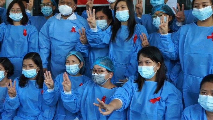 Doctors and medical staff at multiple hospitals across Myanmar donned red ribbons and said they were walking away from all non-emergency work to protest against the coup.