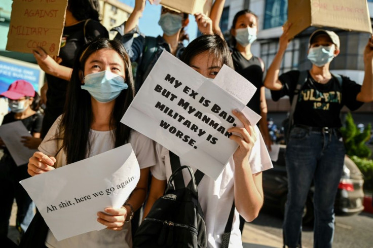 Myanmar protesters are denouncing the military coup with humorous signs that have been shared widely on social media