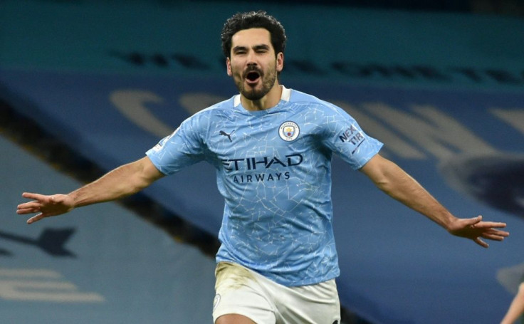 Manchester City midfielder Ilkay Gundogan celebrates scoring against Tottenham