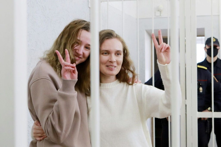 Chultsova, left, and Bakhvalova, shown here flashing the V for victory sign from inside a defendants' cage, had been in pre-trial custody since November