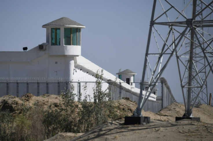 This photo taken on May 31, 2019 shows watchtowers on a high-security facility near what is believed to be a re-education camp where mostly Muslim ethnic minorities are detained, on the outskirts of Hotan, in China's northwestern Xinjiang region