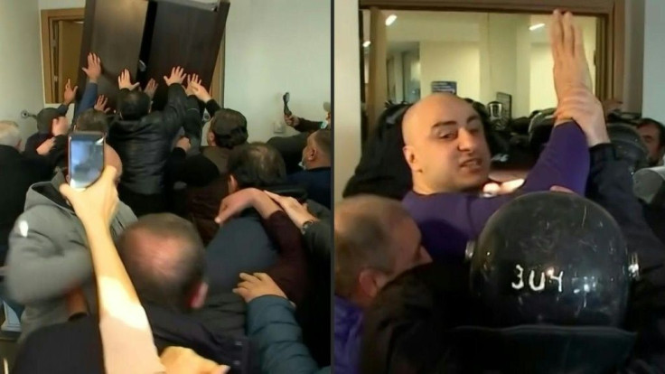 IMAGESGeorgian police arrest a top opposition leader and use tear gas in a violent raid on his party headquarters, further deepening a political crisis sparked by last year's disputed parliamentary elections. Local television footage shows Nika Melia, the