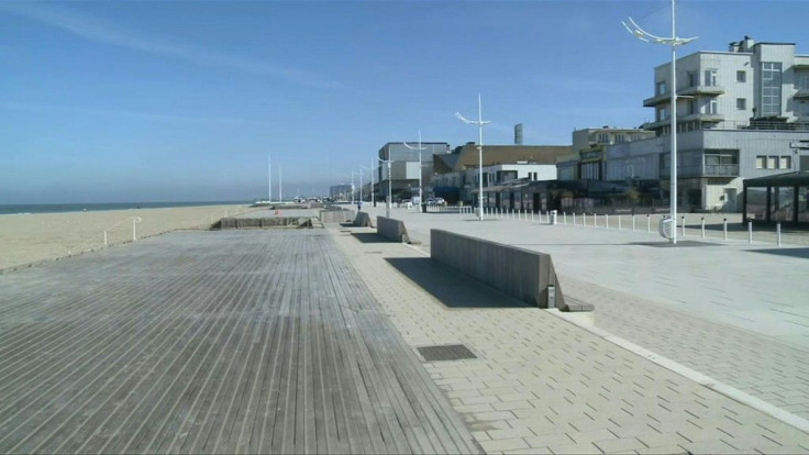 In Dunkirk, France, a sunny but deserted beach as the town goes into a weekend lockdown