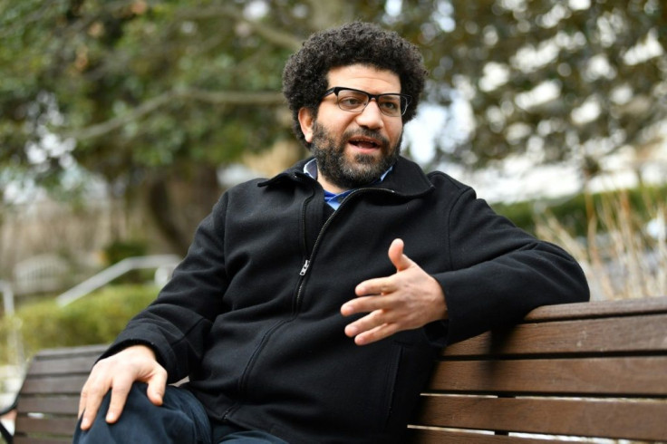 Egyptian activist Sherif Mansour speaks to AFP in a park in the Washington area about harassment against his family