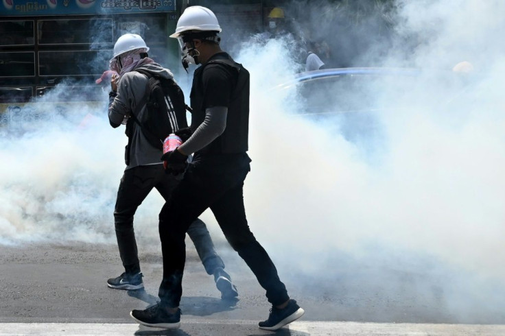 Police fired tear gas to disperse protesters in parts of Yangon