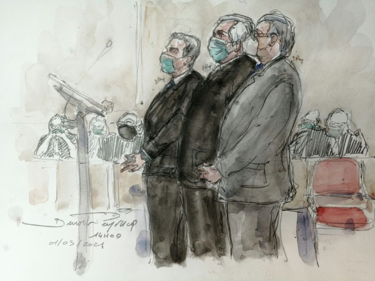 A courtroom sketch of Sarkozy, left, with lawyer Thierry Herzog and ex-senior magistrate Gilbert Azibert