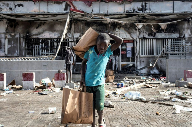 Senegal has seen days of clashes between opposition supporters and police in the West African state with protesters torching cars and shops in the capital Dakar Â