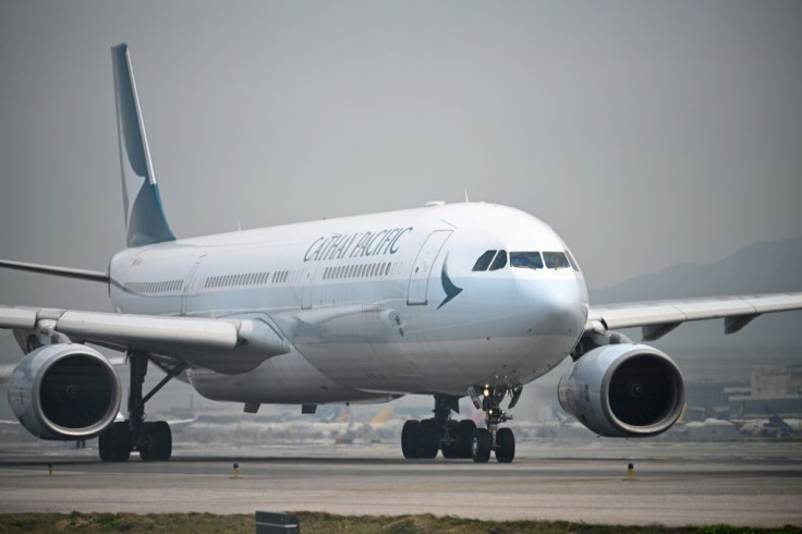 Cathay Pacific warned of a tough road ahead after reporting a record loss for 2020