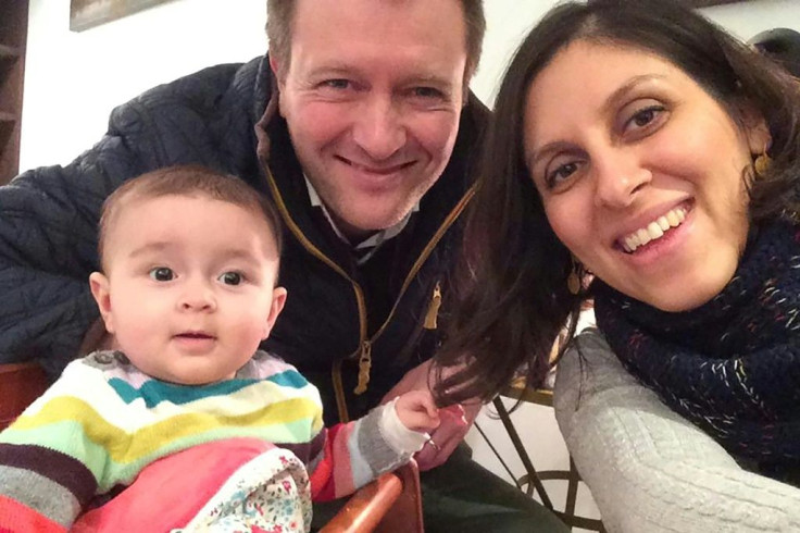 This undated file handout image released by the Free Nazanin campaign in London on June 10, 2016 shows Nazanin Zaghari-Ratcliffe (R) posing for a photograph with her husband Richard and daughter Gabriella (L)