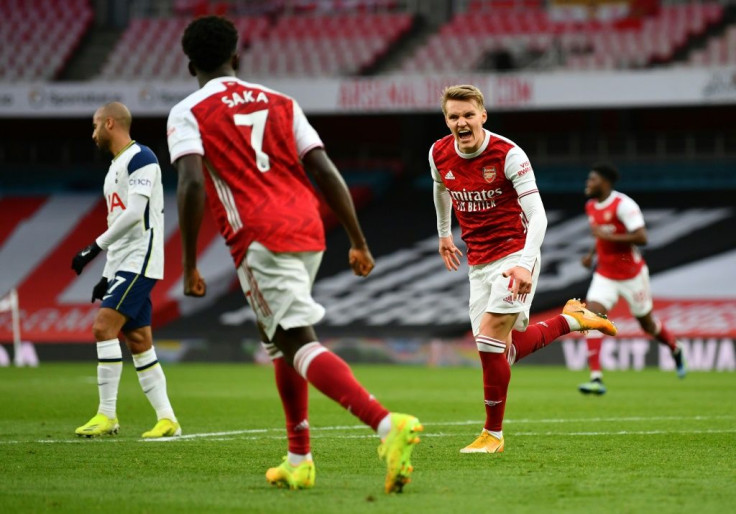 Martin Odegaard (right) struck in Arsenal's 2-1 win over Tottenham