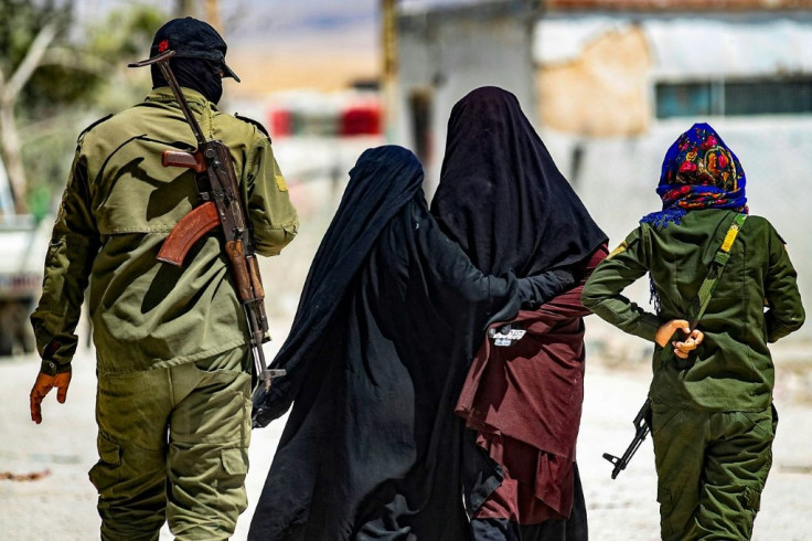 Thousands of people believed to be relatives of IS fighters are held at the Al-Hol camp in Syria