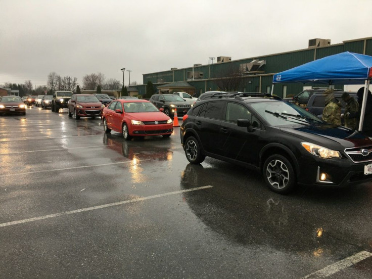 Cars arrive at a Covid vaccination center in Martinsburg, West Virginia, on March 18, 2021; despite vaccine skepticism among many Republicans, the state's vaccination program has been widely lauded