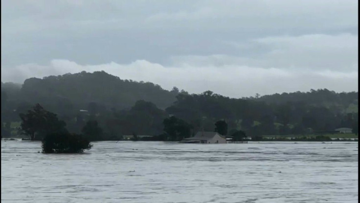 Sydney braces for its worst flooding in decades after record rainfall has caused its largest dam to overflow and prompted mandatory mass evacuation orders along Australia's east coast.