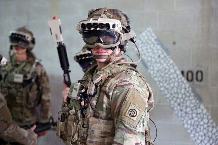 A head-mounted display used by soldiers for battle and training employs sensors for night and thermal vision in addition to providing data for help in engaging targets