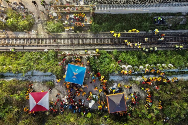 An aerial view shows rescuers working near the site in eastern Taiwan where a train derailed
