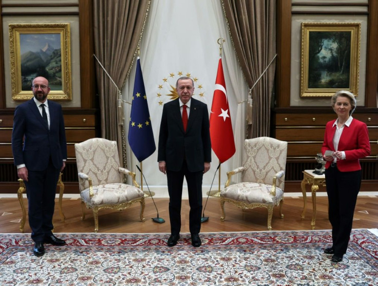 Three presidents, two chairs: Turkey's President Recep Tayyip Erdogan (centre) pictured with EU leaders Ursula von der Leyen and Charles Michel
