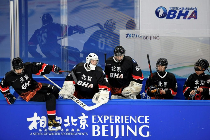 Players are seen at an ice hockey test event for the 2022 Beijing Winter Olympic Games -- the White House says it is not in talks about a possible joint boycott