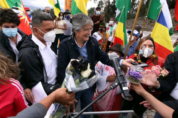 Ecuadoran presidential candidate Guillermo Lasso, greets supporters during his closing campaing rally on April 7, 2021