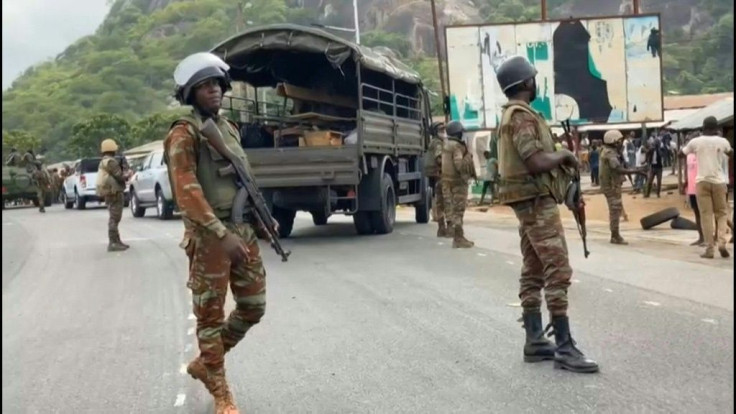 IMAGES Soldiers guard a major highway in SavÃ¨, central Benin, after dispersing demonstrators who blockaded road to protest against President Patrice Talon ahead of fresh elections on Sunday. One person was killed and six were wounded by gunfire in the se