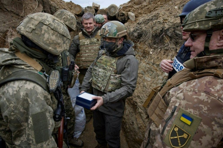 Zelensky meets Ukrainian soldiers in a frontline trench