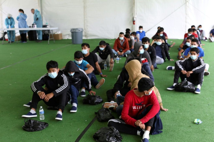 Young migrants wait to be tested for Covid-19 at a Donna, Texas holding facility for unaccompanied children who entered the United States from Mexico