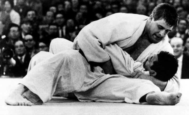 Dutchman Antonius Geesink overcomes Japan's Akio Kaminaga, to win the open judo Olympic gold on October 23, 1964 - AFP