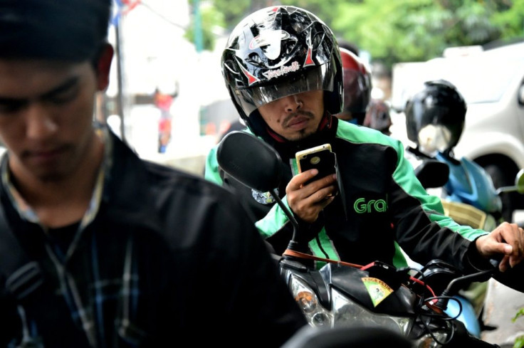 Grab has gone from a humble beginnings as a taxi-hailing firm to a Southeast Asian tech giant