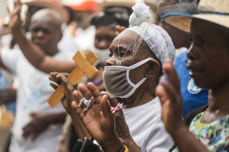 Catholic pilgrims pray ahead of Easter in Port-au-Prince, Haiti on April 2, 2021